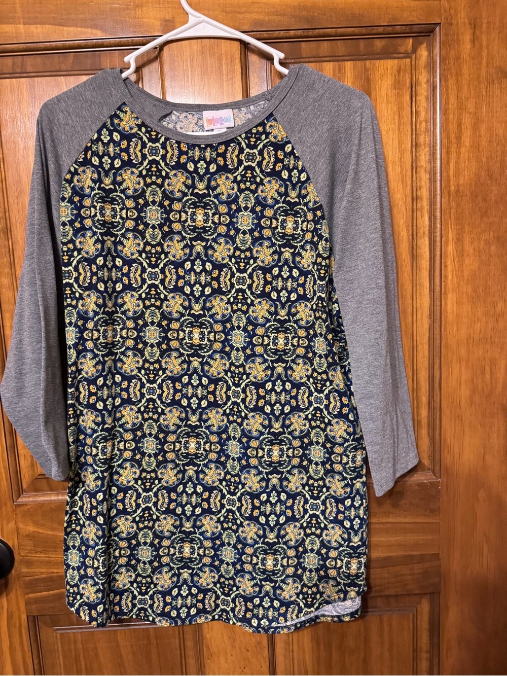 LuLaRoe Grey Sleeve Navy & Gold Patterned Top